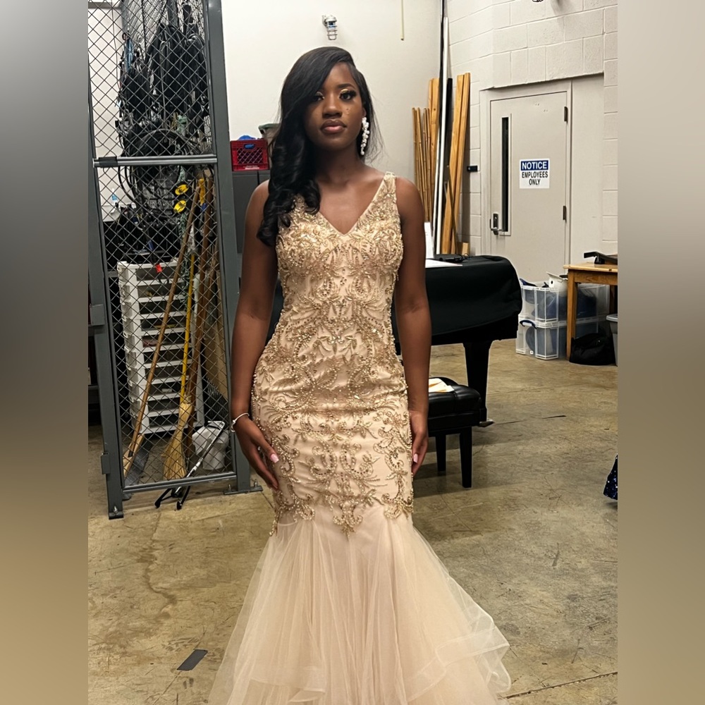 Adored Formal Gown with pearly details and low backdrop